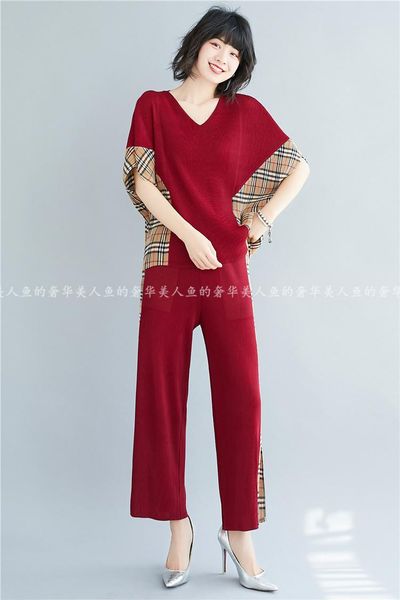 miyake bat sleeve round collar fold loose t-shirts and wide leg pants patchwork gridsuit suit in stock women's two piece, White
miyake bat sleeve round collar fold loose t-shirts and wide leg pants patchwork gridsuit suit in stock women's two piece, White