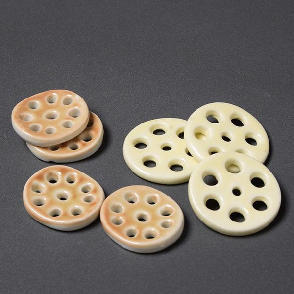 chopsticks 1pc ceramic lotus root slices chopstick rest holder spoon fork rack diy dining table tableware ornaments
chopsticks 1pc ceramic lotus root slices chopstick rest holder spoon fork rack diy dining table tableware ornaments