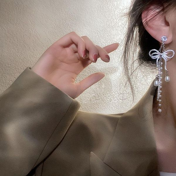 korean shiny crystal hollow heart bowknot long pendientes mujer moda bijoux rhinestone pearl earrings dangle & chandelier, Silver
korean shiny crystal hollow heart bowknot long pendientes mujer moda bijoux rhinestone pearl earrings dangle & chandelier, Silver