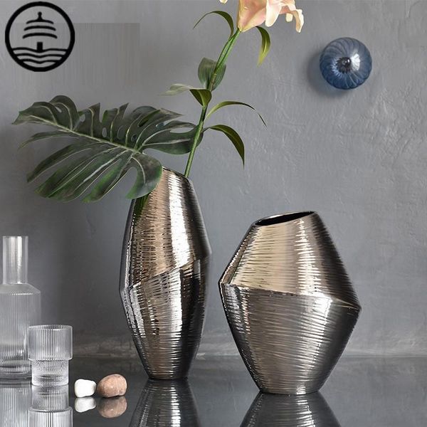 guang ta nordic creative geometry silver vase art sculpture foliage flower receptacle ceramic craft home decoration r5972 vases
guang ta nordic creative geometry silver vase art sculpture foliage flower receptacle ceramic craft home decoration r5972 vases
