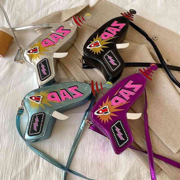 new fashion creative fun flash letter reflective bright face pistol women's trendy pu messenger bag children
new fashion creative fun flash letter reflective bright face pistol women's trendy pu messenger bag children