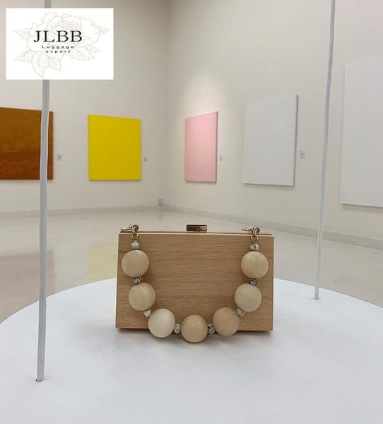evening bags women messenger wood clutch bag elegant banquet shoulder wooden ball chain handbags hasp
evening bags women messenger wood clutch bag elegant banquet shoulder wooden ball chain handbags hasp
