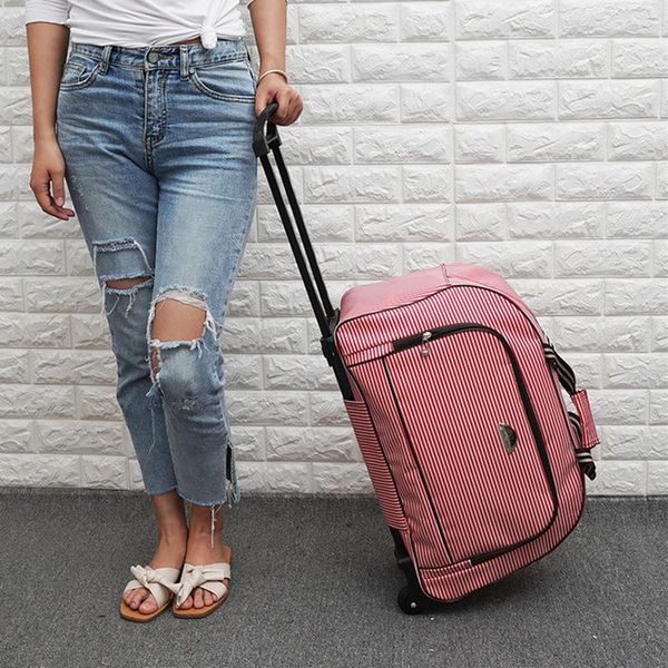 suitcases 2021 trolley bag female large capacity travel handbag tow luggage male with wheels 
suitcases 2021 trolley bag female large capacity travel handbag tow luggage male with wheels