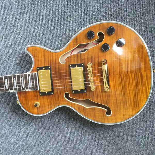 custom electric guitar yellow color golden hardware arch back flamed maple factory direct
custom electric guitar yellow color golden hardware arch back flamed maple factory direct