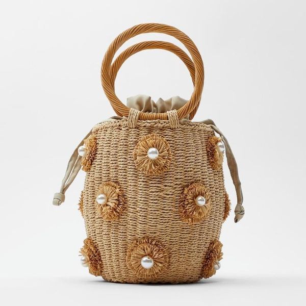 evening bags women's bag flower artificial pearl decoration handbag-style woven straw source manufacturers
evening bags women's bag flower artificial pearl decoration handbag-style woven straw source manufacturers