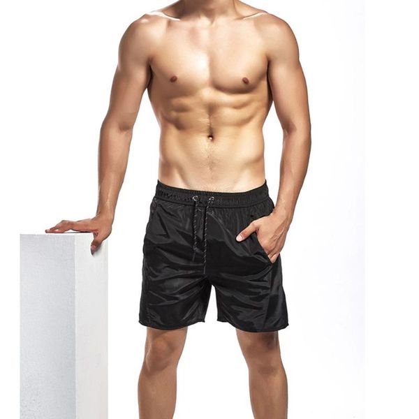 men's solid casual loose belt drawstring beach pocket shorts pants quick drying surffing for men l413a, White;black
men's solid casual loose belt drawstring beach pocket shorts pants quick drying surffing for men l413a, White;black