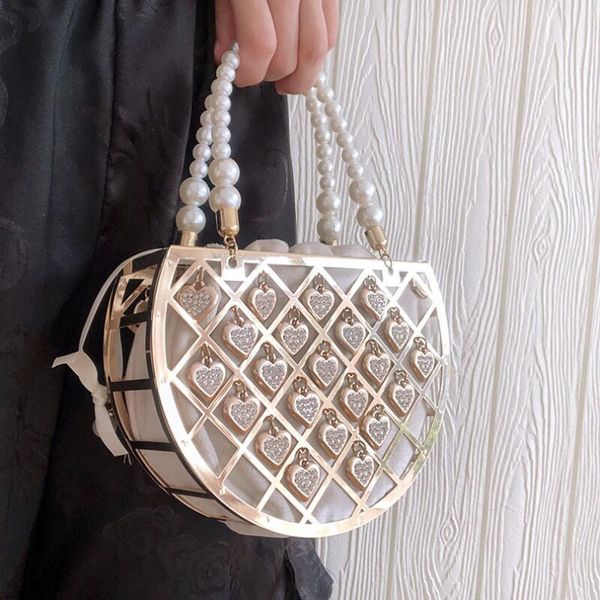 evening bags summer luxury high-end handbags 2021 metal hollow dinner pearl chain women's designer fashion shoulder messenger bag
evening bags summer luxury high-end handbags 2021 metal hollow dinner pearl chain women's designer fashion shoulder messenger bag