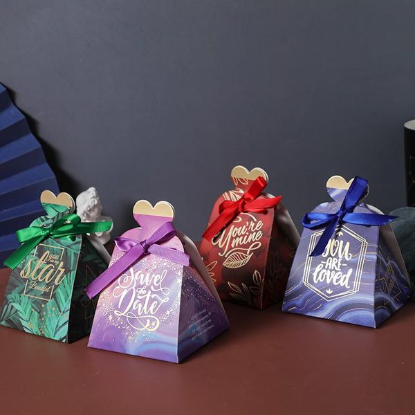 gift wrap 10/20/50pcs triangle candy box for party wedding creative sweet love printed color ribbon bowknot handmade paperboard bag
gift wrap 10/20/50pcs triangle candy box for party wedding creative sweet love printed color ribbon bowknot handmade paperboard bag
