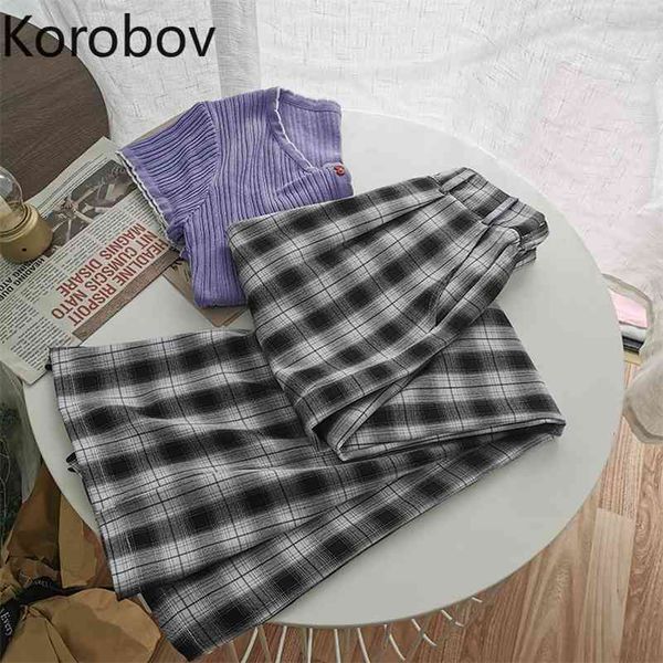 korobov vintage high waist women plaid pants summer new chic loose casual trousers preppy style women joggers 210430, Black;white
korobov vintage high waist women plaid pants summer new chic loose casual trousers preppy style women joggers 210430, Black;white