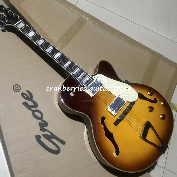 grote jazz electric guitar, sunset color,white pickguard ,hollow body,rosewood fingerboard,big jazz guitarra,double f hole,
grote jazz electric guitar, sunset color,white pickguard ,hollow body,rosewood fingerboard,big jazz guitarra,double f hole,