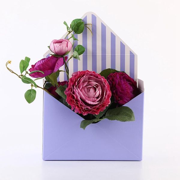 hand holds folding floral bouquet paper box romantic flower holder decor 10pcs envelope boxes gift wrap
hand holds folding floral bouquet paper box romantic flower holder decor 10pcs envelope boxes gift wrap