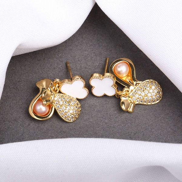 korean east gate clover fashion simple aesthetic small blessing bag natural freshwater pearl earrings, Black
korean east gate clover fashion simple aesthetic small blessing bag natural freshwater pearl earrings, Black