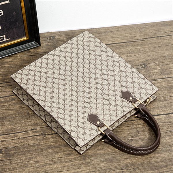 factory wholesale brand women bag classic printed business handbag fashion professional leather mens and womens hand-held file bagss vintage
factory wholesale brand women bag classic printed business handbag fashion professional leather mens and womens hand-held file bagss vintage