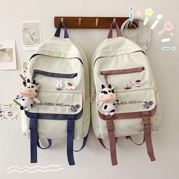 school bags cute pendant design women's backpack panelled ladies student bag nylon women teenager sac
school bags cute pendant design women's backpack panelled ladies student bag nylon women teenager sac