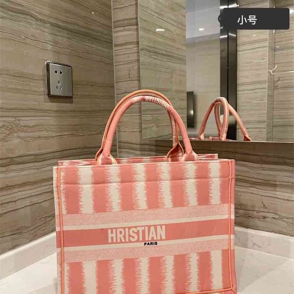 2021 striped pink black shopping bag seasonal limited design fashionable female style street shoulder luxuryss designerss yw
2021 striped pink black shopping bag seasonal limited design fashionable female style street shoulder luxuryss designerss yw