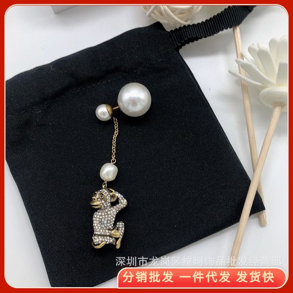 charms large and small pearls full of diamonds lovely monkey pendant earrings fashion exaggerated copper animal gift, Golden
charms large and small pearls full of diamonds lovely monkey pendant earrings fashion exaggerated copper animal gift, Golden