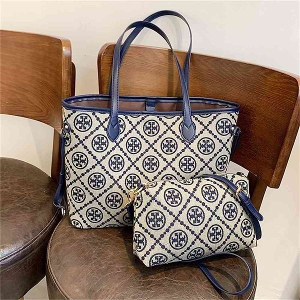 large capacity mother son bag new fashion single shoulder hand purse
large capacity mother son bag new fashion single shoulder hand purse