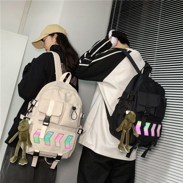 backpack 2021 arrow reflective stripe japanese lumious boys girls schoolbag college teen lapbookbag with frog pendant
backpack 2021 arrow reflective stripe japanese lumious boys girls schoolbag college teen lapbookbag with frog pendant