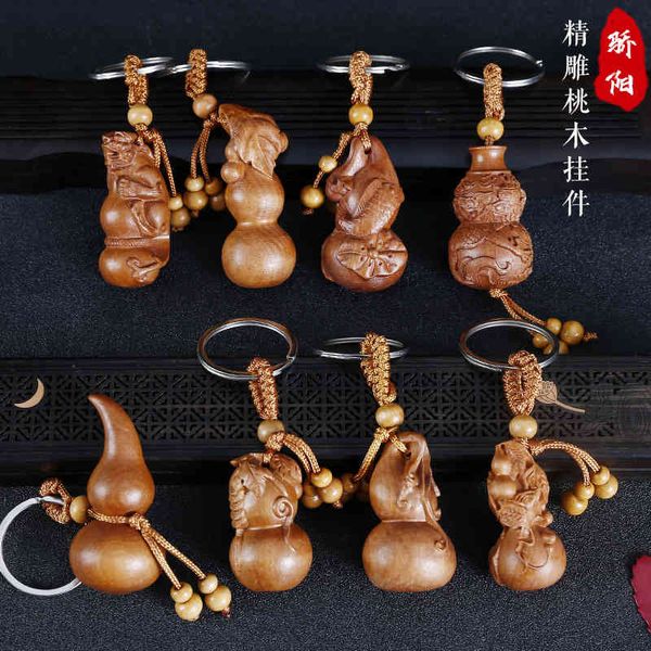 new peach wood car pendant gourd three dimensional carving wooden jewelry bag key chain scenic spot gift, Silver
new peach wood car pendant gourd three dimensional carving wooden jewelry bag key chain scenic spot gift, Silver
