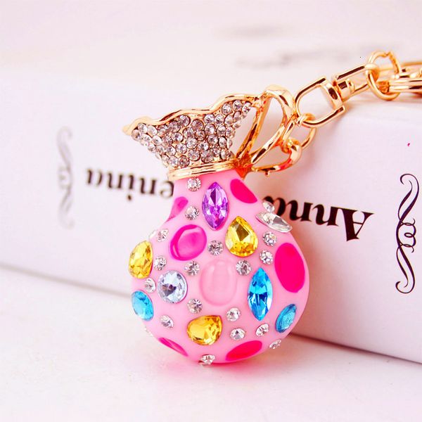 souvenir kuxi jewelry color resin crafts money bag key chain women's accessories metal pendant
souvenir kuxi jewelry color resin crafts money bag key chain women's accessories metal pendant