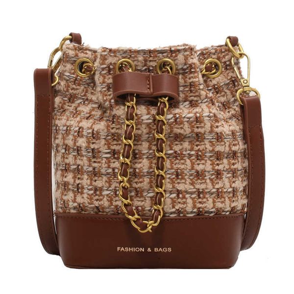 luxury clutch bag woolen color matching bucket women's crossbody chain drawstring 
luxury clutch bag woolen color matching bucket women's crossbody chain drawstring