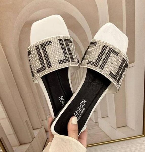 rhinestone alphabet sandals women's 2022 new spring and summer fashion wear one word non-slip open toe flat slippers, Black
rhinestone alphabet sandals women's 2022 new spring and summer fashion wear one word non-slip open toe flat slippers, Black