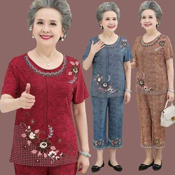 large size women 2 piece set loose print short-sleeved t-shirt pants suits middle-aged mother summer plus size 5xl y870, White
large size women 2 piece set loose print short-sleeved t-shirt pants suits middle-aged mother summer plus size 5xl y870, White