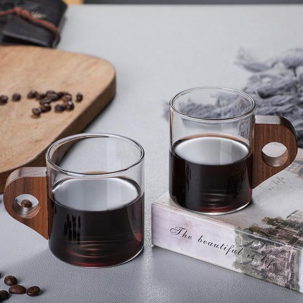 mugs glass coffee cup with hanging ear juice milk breakfast wooden handle household
mugs glass coffee cup with hanging ear juice milk breakfast wooden handle household