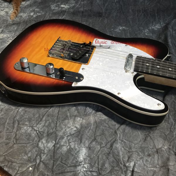 new style t l electric guitar, alder body flame maple sunburst color pearl pick guard 6 strings
new style t l electric guitar, alder body flame maple sunburst color pearl pick guard 6 strings