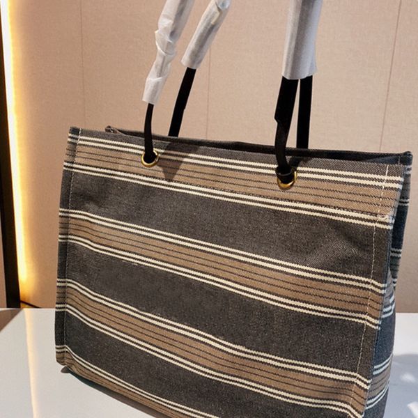 5a+ tote bag designer handbag shoulder bags luxury totes handbags canvas stripes artwork high-quality fashion brand with original box size 4
5a+ tote bag designer handbag shoulder bags luxury totes handbags canvas stripes artwork high-quality fashion brand with original box size 4