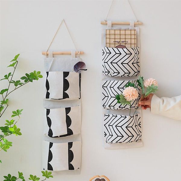 storage bags 3 pockets hanging bag wall mounted linen clothes organizer closet children room pouch for home
storage bags 3 pockets hanging bag wall mounted linen clothes organizer closet children room pouch for home