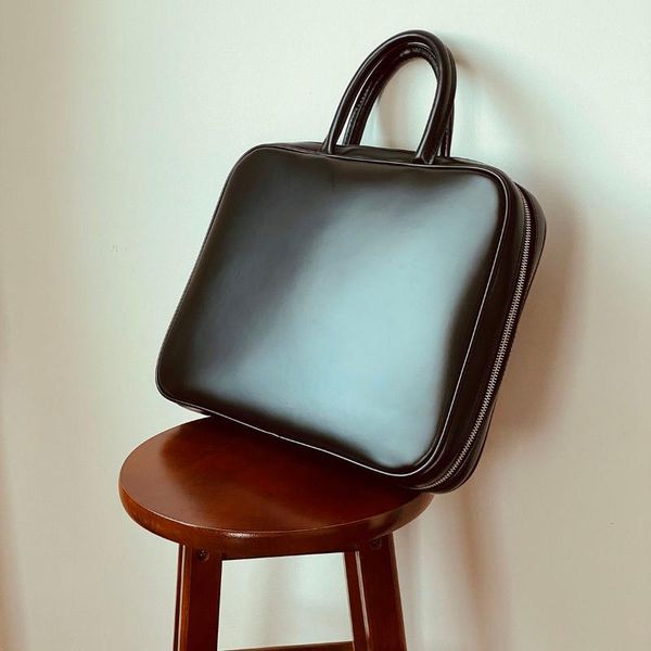 simple handbag briefcase business square slung commuter cowhide senior lapbag fashion briefcases
simple handbag briefcase business square slung commuter cowhide senior lapbag fashion briefcases