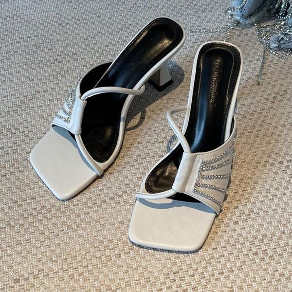 2021 new cross rhinestone hollow square head high heel sandals and slippers female catwalk niche zebra stiletto sandals, Black
2021 new cross rhinestone hollow square head high heel sandals and slippers female catwalk niche zebra stiletto sandals, Black