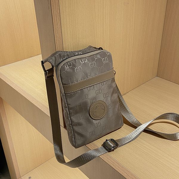 luxury designer bag women new versatile oxford cloth mobile phone bag women's style fashion mini one shoulder messenger zero wallet
luxury designer bag women new versatile oxford cloth mobile phone bag women's style fashion mini one shoulder messenger zero wallet