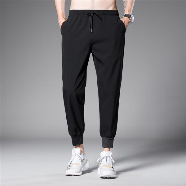 shorts summer men's ice silk capris loose elastic leggings youth pure simple sports casual pants, White;black
shorts summer men's ice silk capris loose elastic leggings youth pure simple sports casual pants, White;black