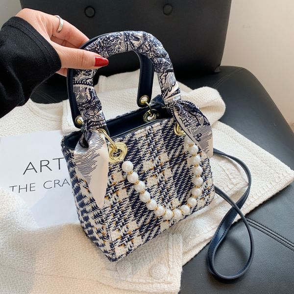 design jewelry bag women summer new fashion woolen plaid portable princess women's net red texture pearl diagonal bag
design jewelry bag women summer new fashion woolen plaid portable princess women's net red texture pearl diagonal bag