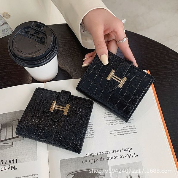 2021 new women's short folding fashion soft leather wallet multi card slot change bag, Red;black
2021 new women's short folding fashion soft leather wallet multi card slot change bag, Red;black