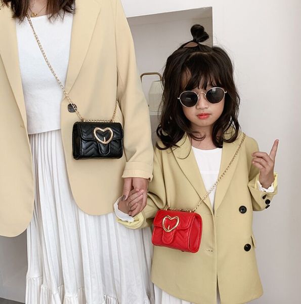 girls metal letter handbag kids love heart quilted chain bags lady style children pu leather single-shoulder bag 1012
girls metal letter handbag kids love heart quilted chain bags lady style children pu leather single-shoulder bag 1012