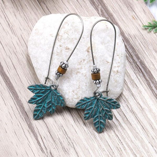 vintage wood beads leaf pendant hoop earrings for women girls ethnic bohemia carved drop ear cuff & huggie, Golden;silver
vintage wood beads leaf pendant hoop earrings for women girls ethnic bohemia carved drop ear cuff & huggie, Golden;silver