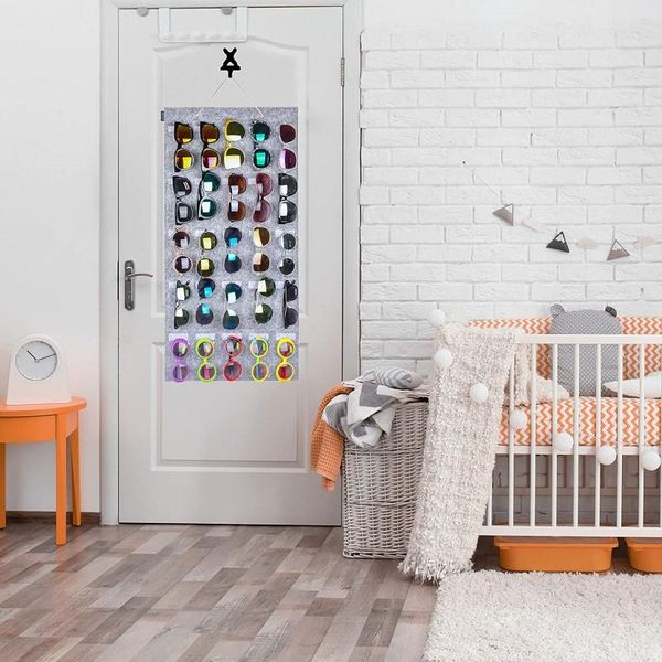 sunglasses organizer hanging wall felt slots glasses holder dustproof bedroom living room door eyeglasses storage bags
sunglasses organizer hanging wall felt slots glasses holder dustproof bedroom living room door eyeglasses storage bags