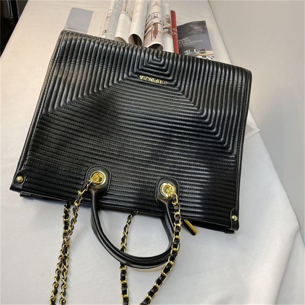 designers duffel bags 45cm 55cm luxury large capacity travel sale women men genuine leather shoulder fashion bag carry rivets with lock head
designers duffel bags 45cm 55cm luxury large capacity travel sale women men genuine leather shoulder fashion bag carry rivets with lock head
