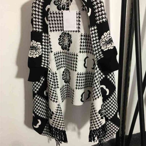 2021ss fashion women designer wool knit cape shawl plaid jacquard tassel midi coathen brand letter logo girls clothes winter loose windbreak, Tan;black
2021ss fashion women designer wool knit cape shawl plaid jacquard tassel midi coathen brand letter logo girls clothes winter loose windbreak, Tan;black