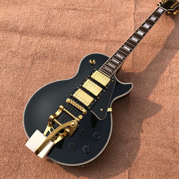 6 strings black mahogany electric guitar with big tremolo,rosewood fretboard,customizable
6 strings black mahogany electric guitar with big tremolo,rosewood fretboard,customizable