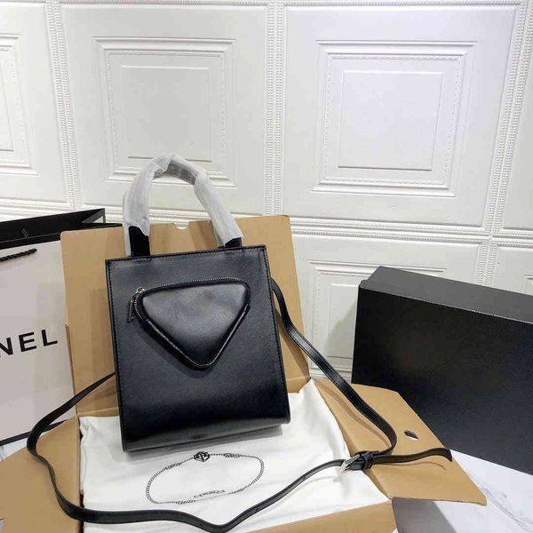 design s new triangle light one shoulder messenger bag mommy hand portable shopping bag
design s new triangle light one shoulder messenger bag mommy hand portable shopping bag