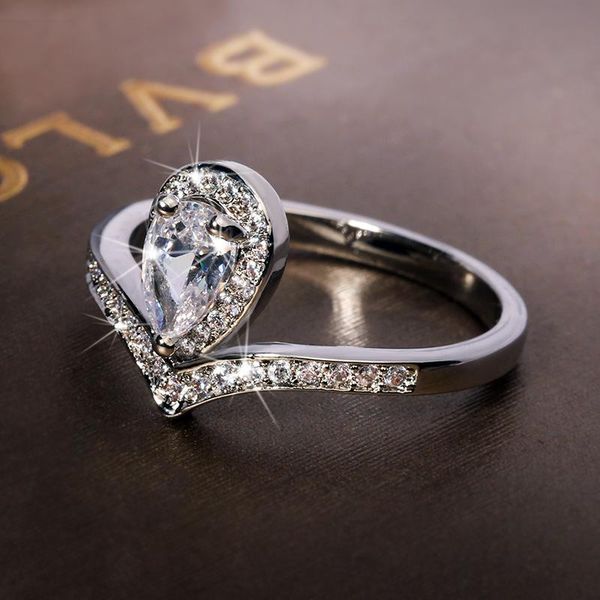 cluster rings delicate water drop shaped encrusted shiny zircon ring jewelry gemstones for women female wedding gift, Golden;silver
cluster rings delicate water drop shaped encrusted shiny zircon ring jewelry gemstones for women female wedding gift, Golden;silver