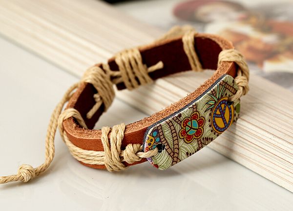 2015 latest version punk style 1.2cm*17cm 100% genuine leather bracelet with flowers peace sign leather bracelet, Black
2015 latest version punk style 1.2cm*17cm 100% genuine leather bracelet with flowers peace sign leather bracelet, Black