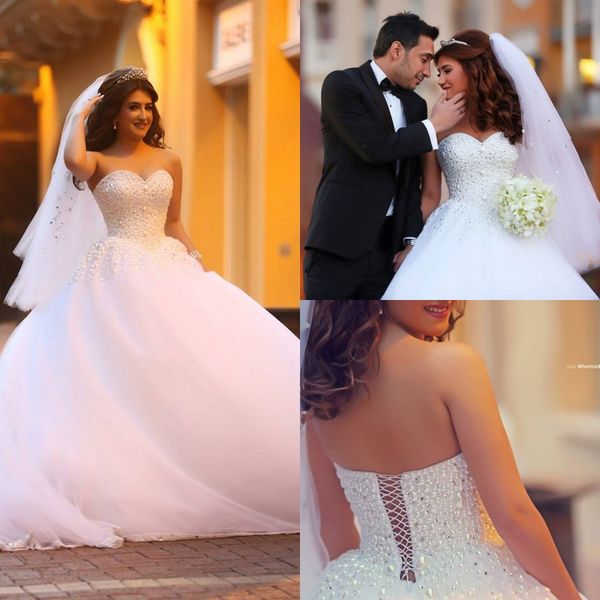 sweetheart backless ball gown wedding dresses sleeveless pearl beads handmade on white tulle chapel train bridal dress
sweetheart backless ball gown wedding dresses sleeveless pearl beads handmade on white tulle chapel train bridal dress