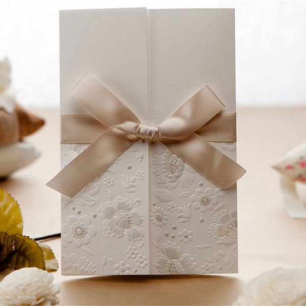 

wholesale- 30pcs laser cut wedding / event invitations card delicated hollow embossed tri-fold with elegant ribbon bow customized printing