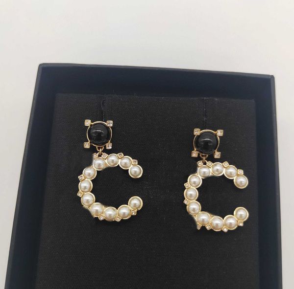 dangle charm drop earring with diamond and nature shell beads black color design in 18k gold plated for women wedding jewelry gift have box, Golden
dangle charm drop earring with diamond and nature shell beads black color design in 18k gold plated for women wedding jewelry gift have box, Golden