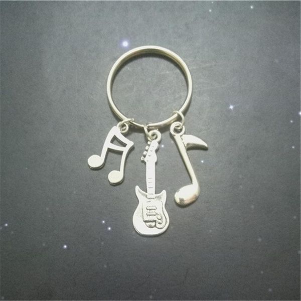 keychains creative novelty gift music notes and guitar keychain rings diy handmade for lover, Silver
keychains creative novelty gift music notes and guitar keychain rings diy handmade for lover, Silver